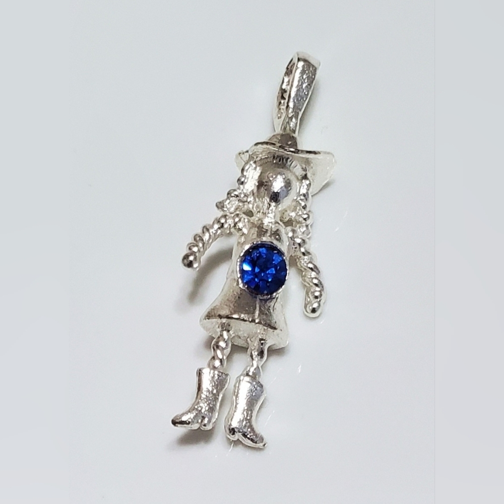 Silver pendant (cowgirl) sapphire birthstone